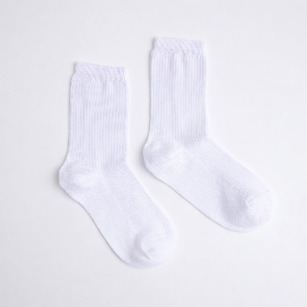 Pair of white socks on a light gray background

