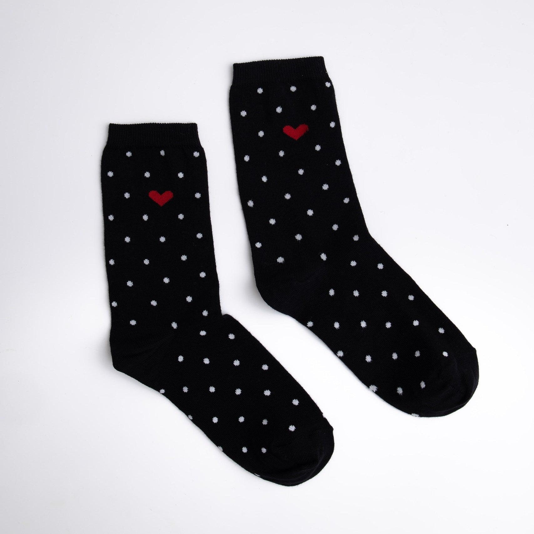 Black socks with white dots and red heart on a white background

