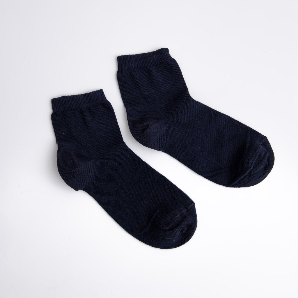 Pair of dark blue socks on a white background

