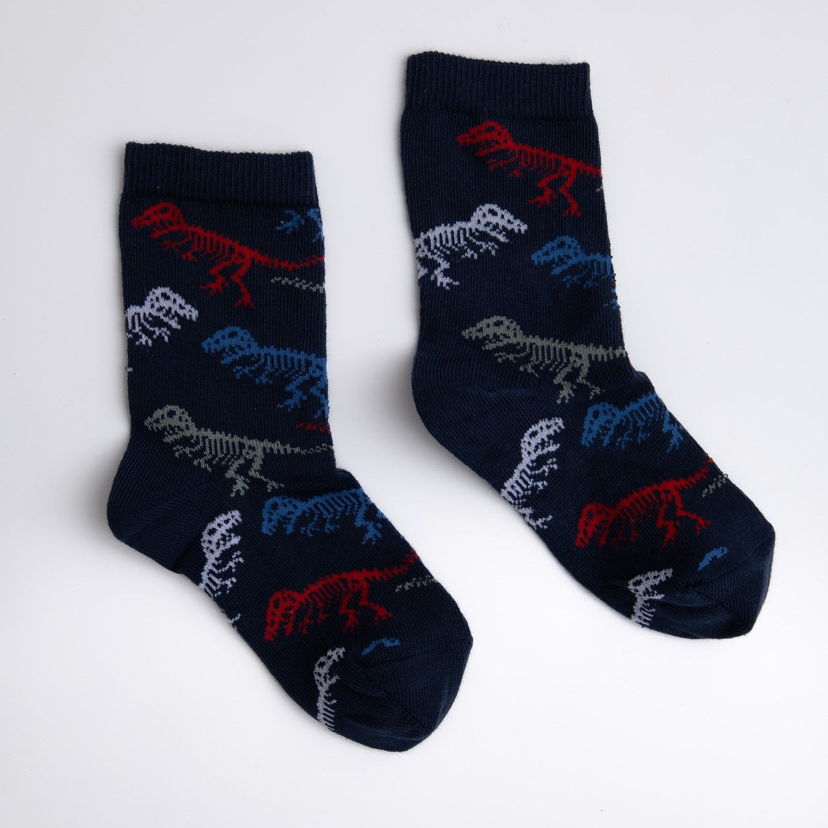 Pair of dark blue socks with colorful animal patterns on a white background


