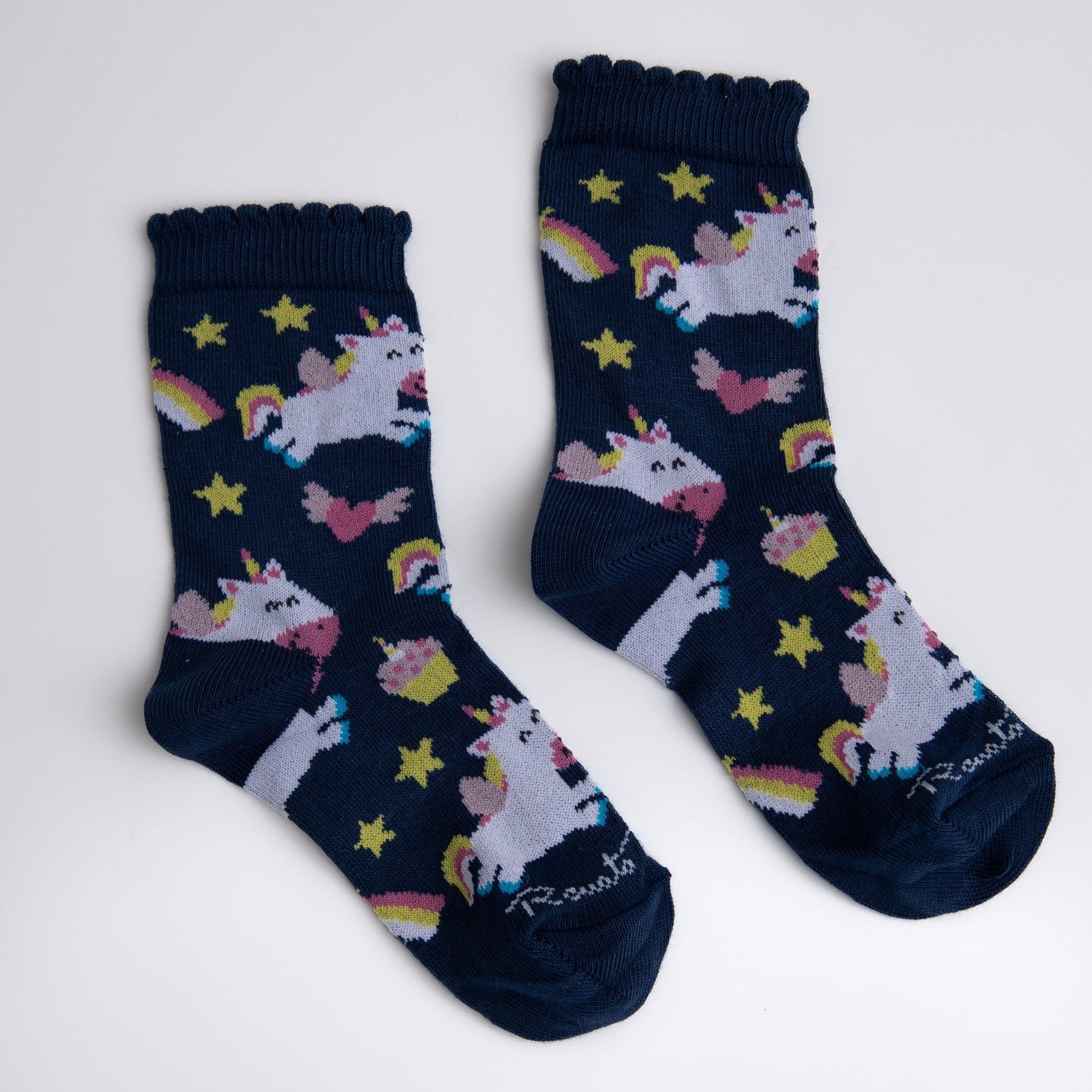 Navy blue socks with unicorn and rainbow patterns on a white background

