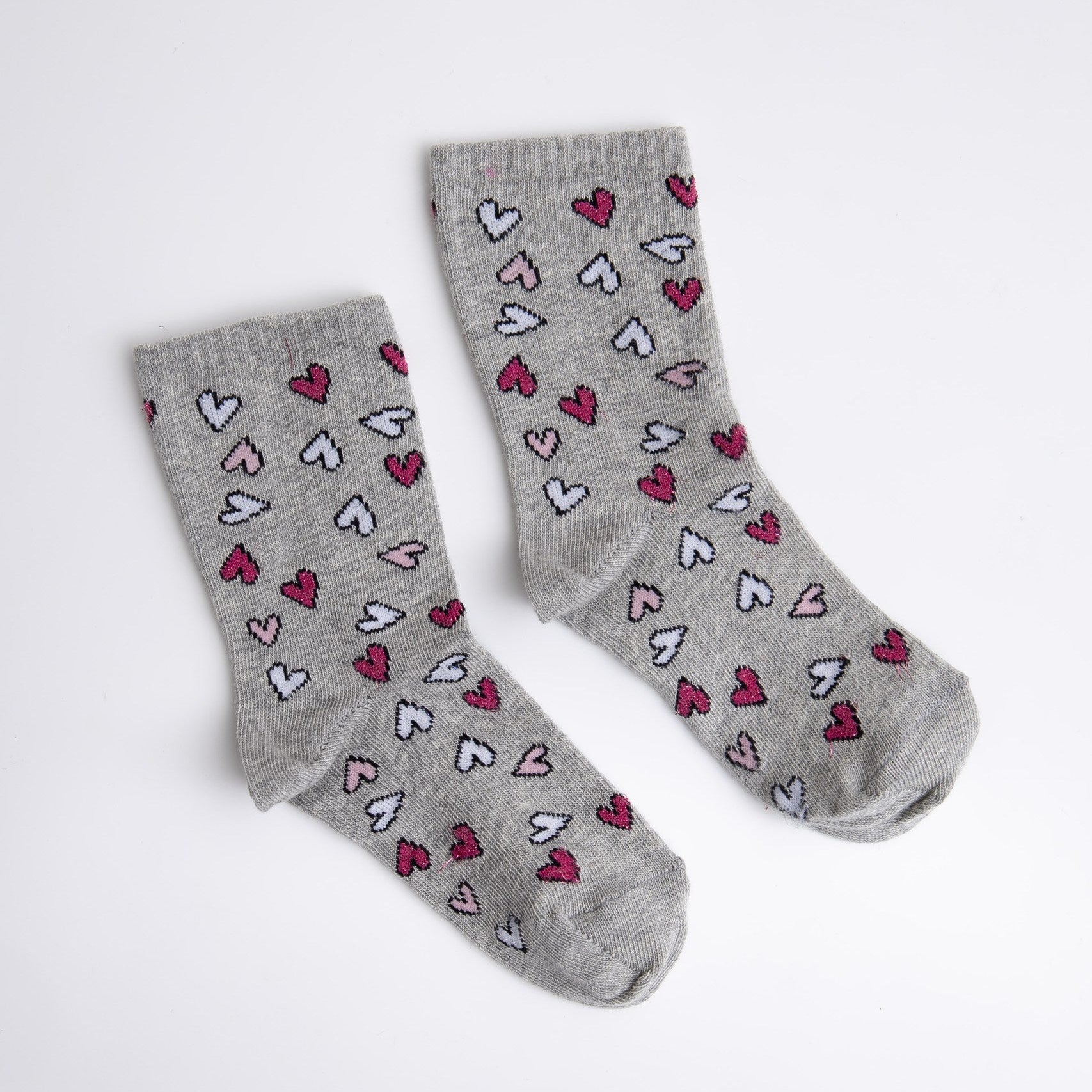 Gray socks with heart patterns on a white background

