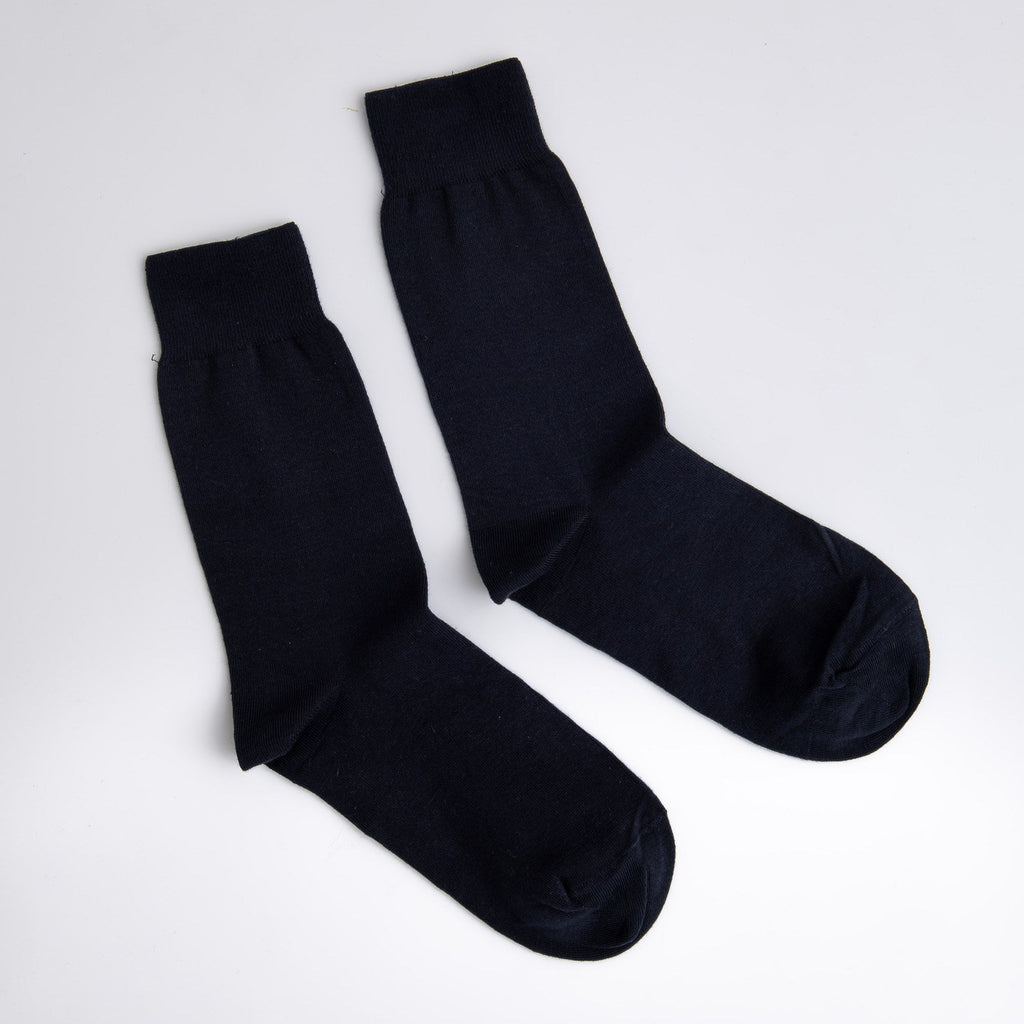 Pair of black socks on a white background

