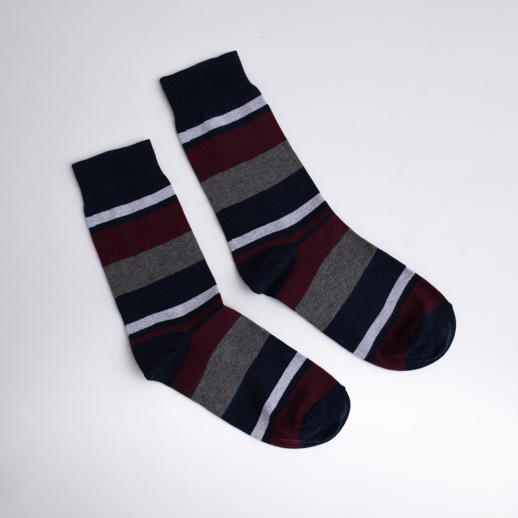 Pair of striped socks on a white background

