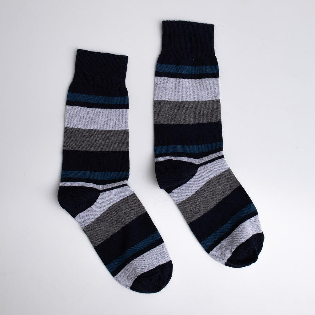 Pair of striped socks on a light gray background

