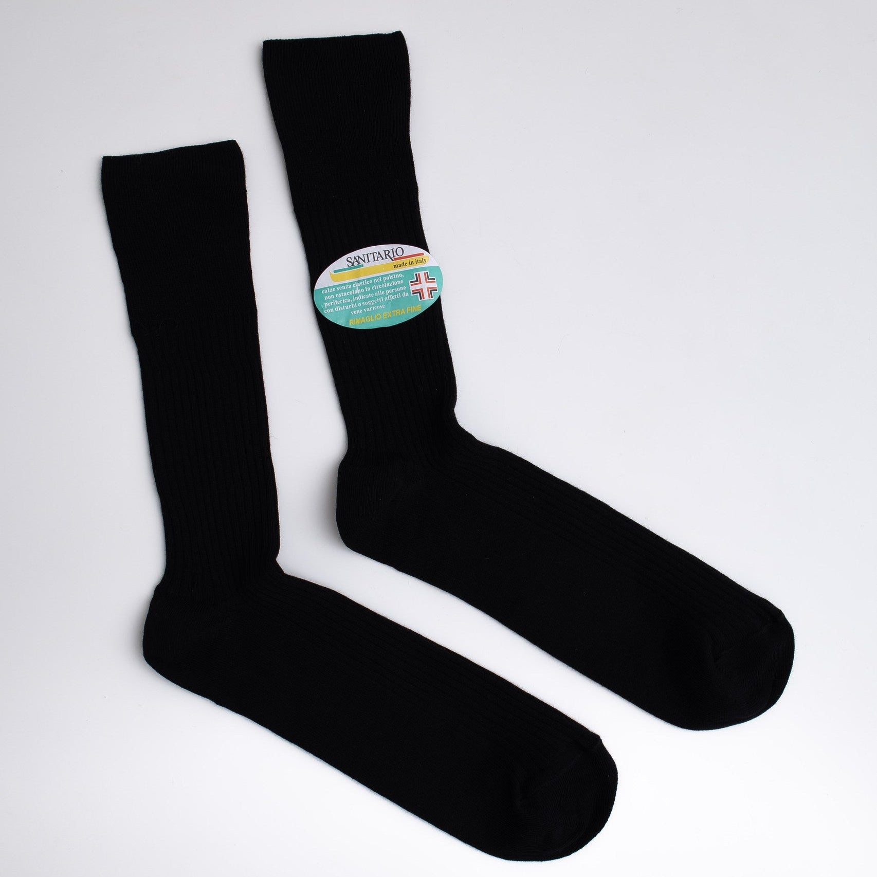 Black socks with a colorful label on a white background

