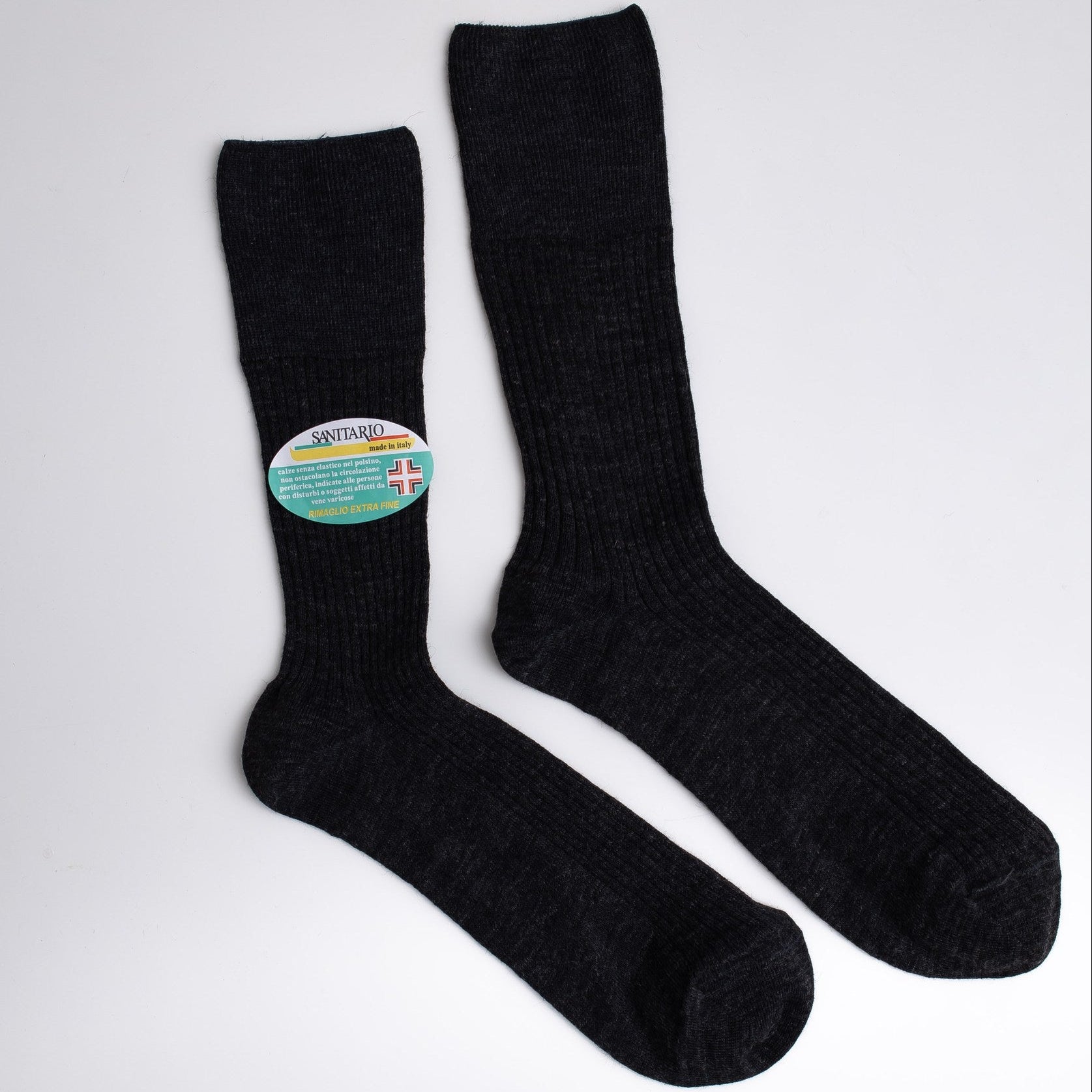 Black socks with a colorful label on a white background

