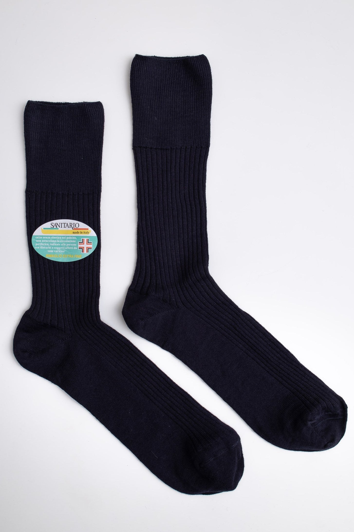 Blue socks with a colorful label on a white background

