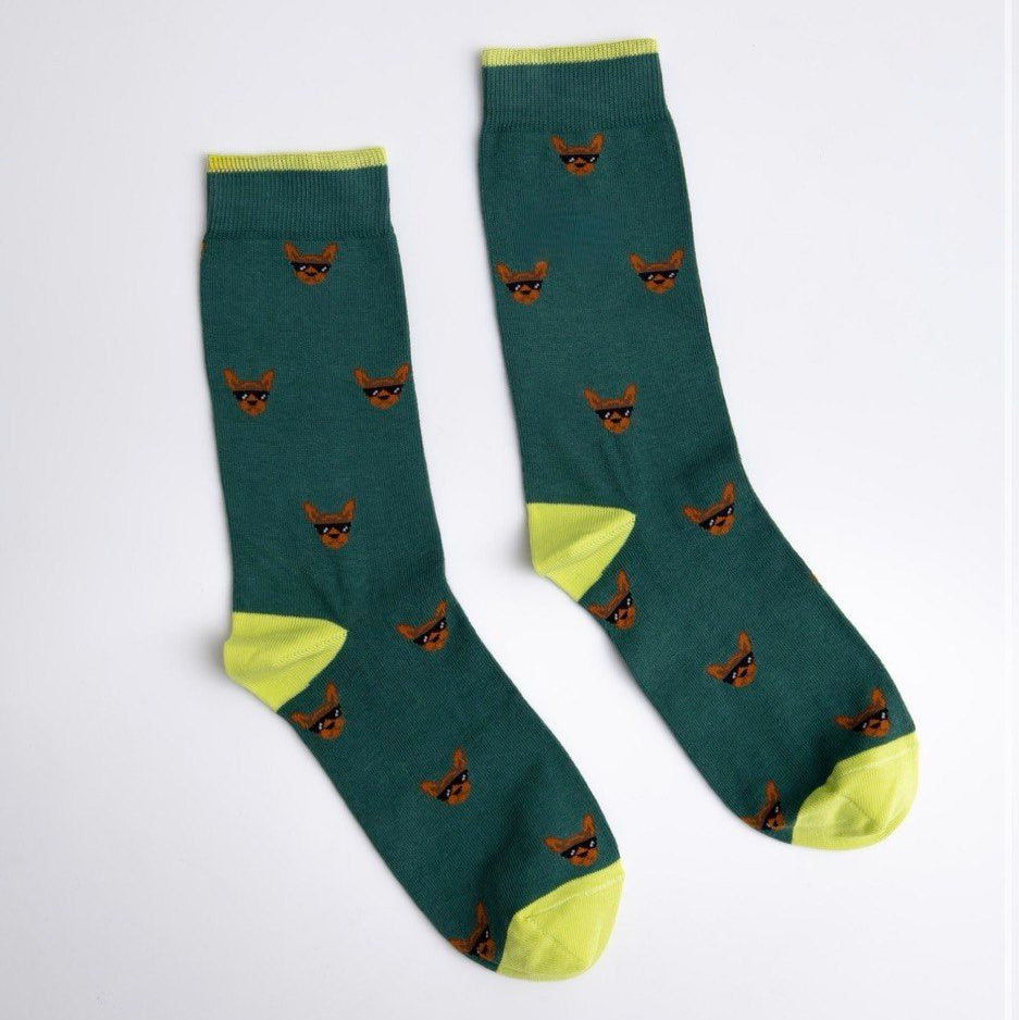 Green socks with brown patterns on a white background